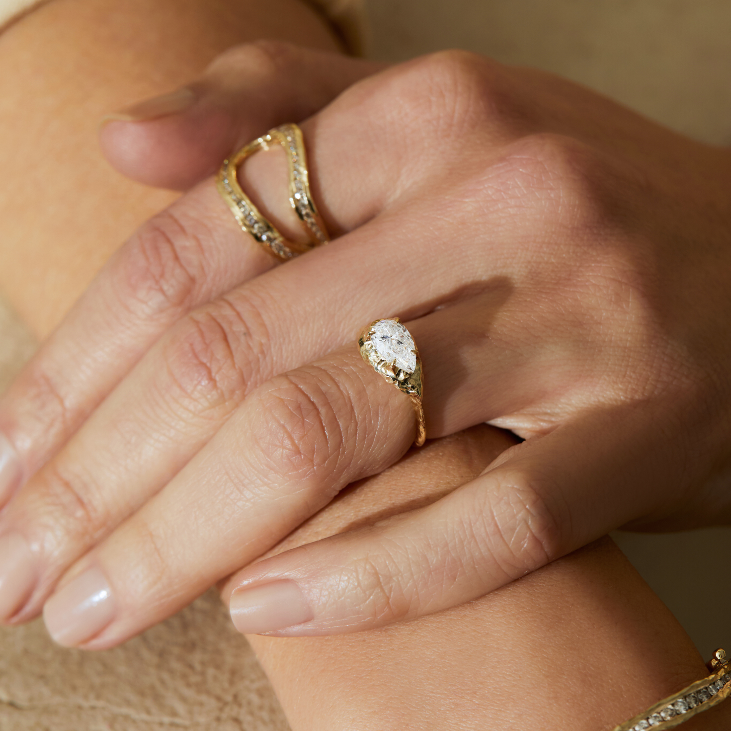East-West Pear-cut Engagement Ring