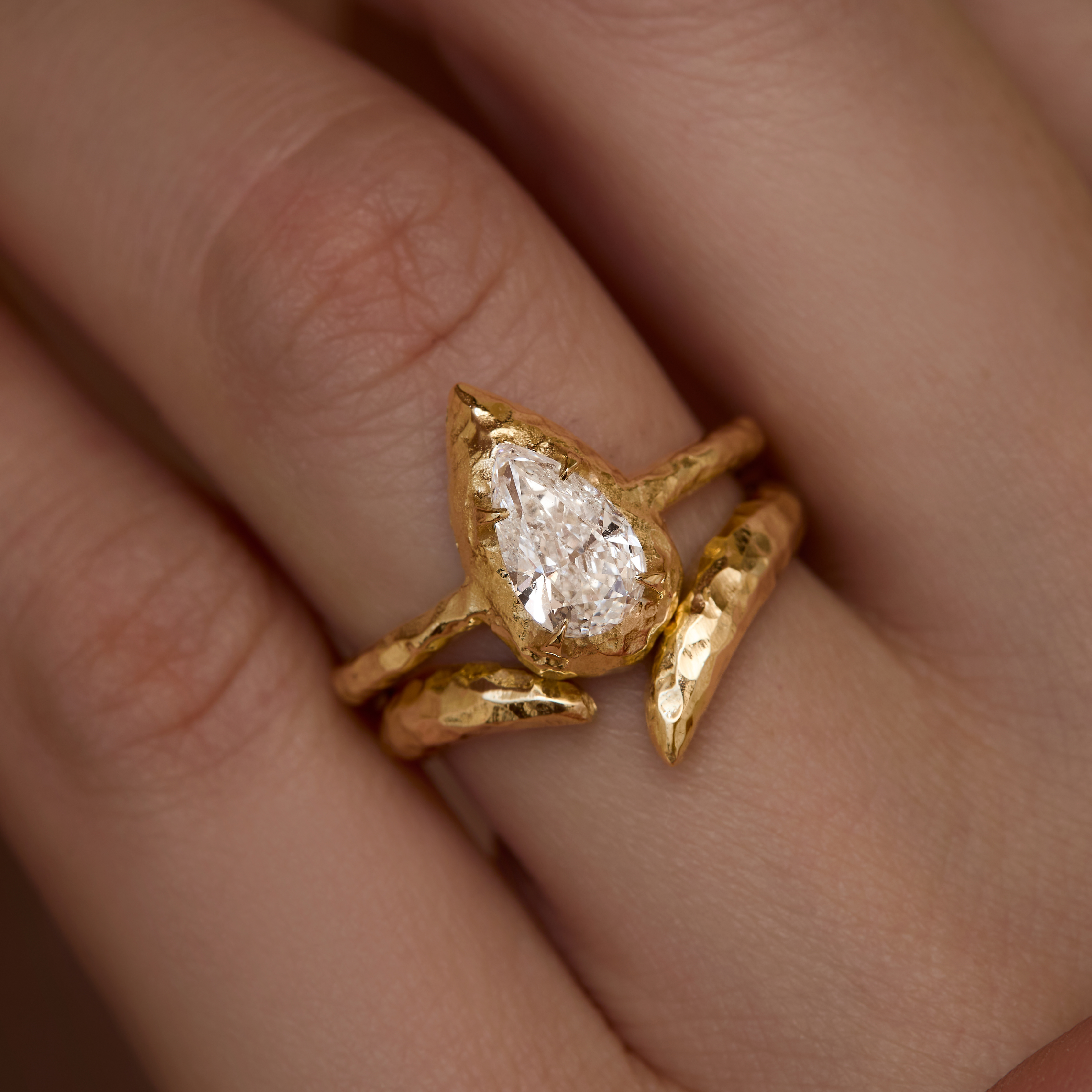 North-South Pear-cut Engagement Ring