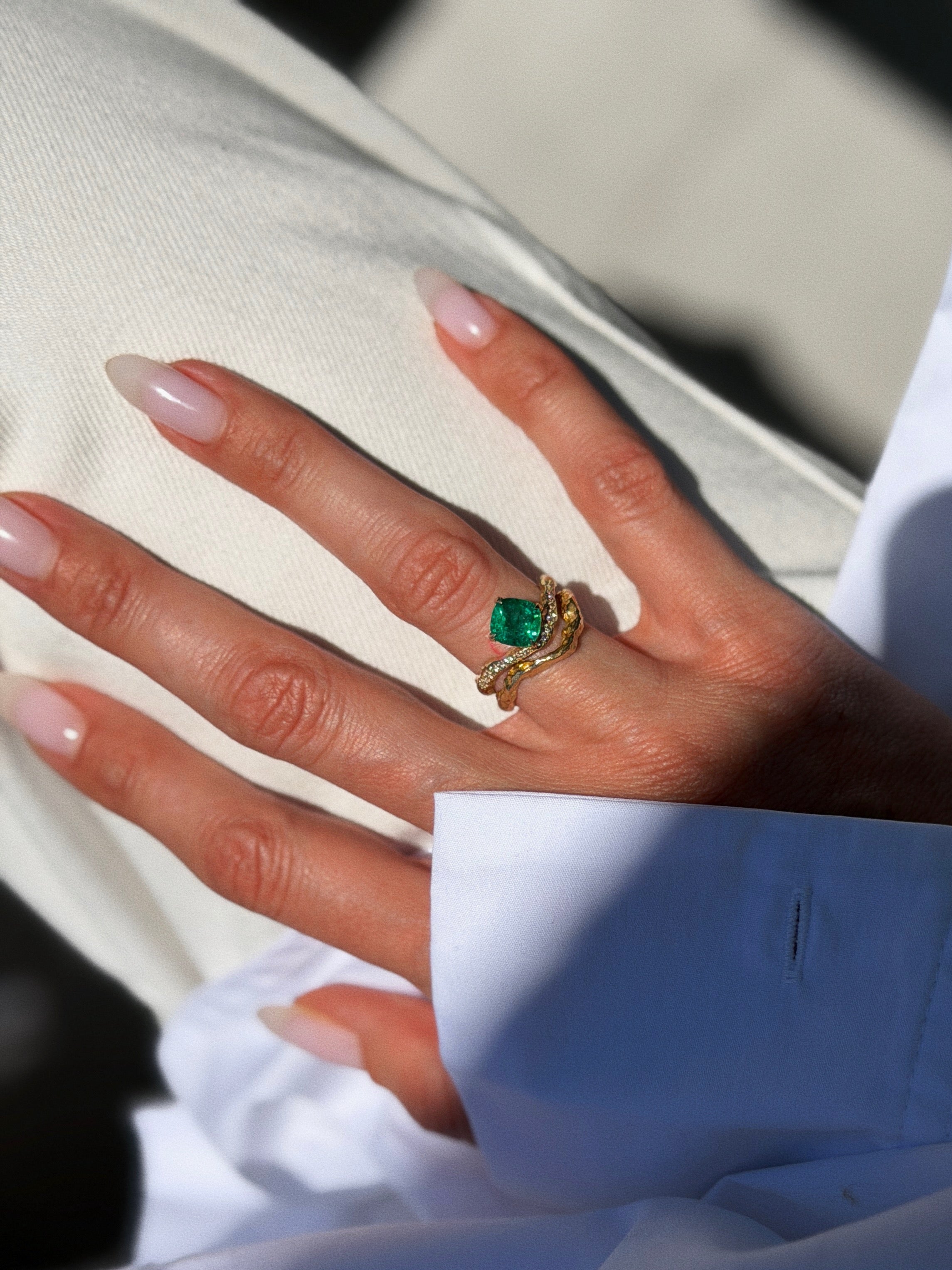 Cushion-Cut Emerald Wave Ring with Diamond Pavé