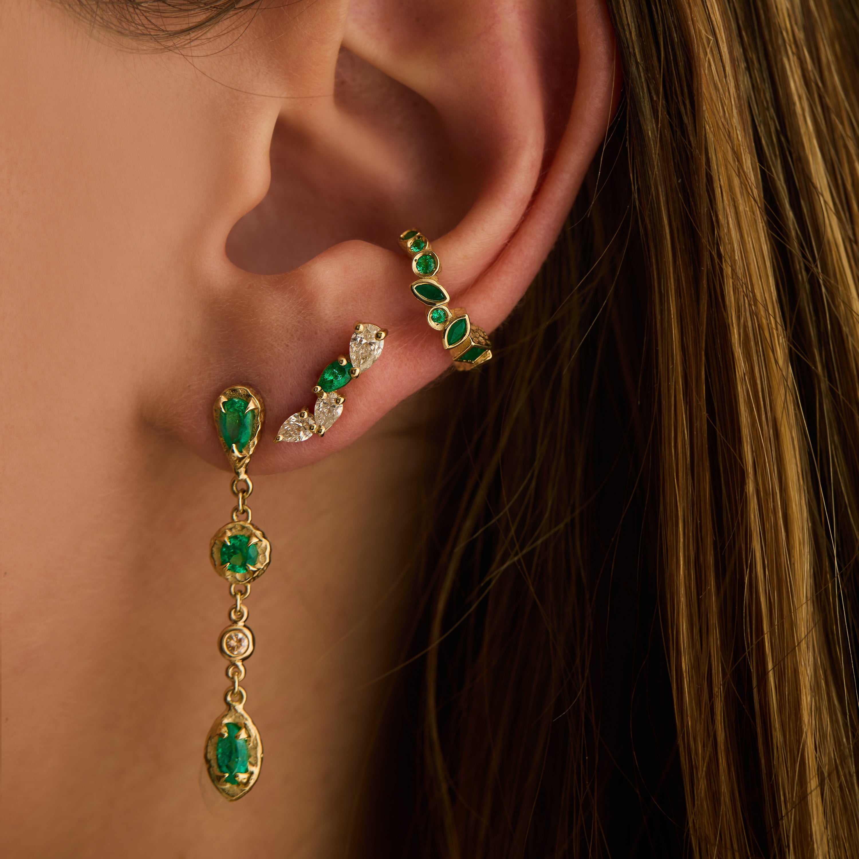 Sculptural emerald drop earrings with hand-carved organic texture in gold