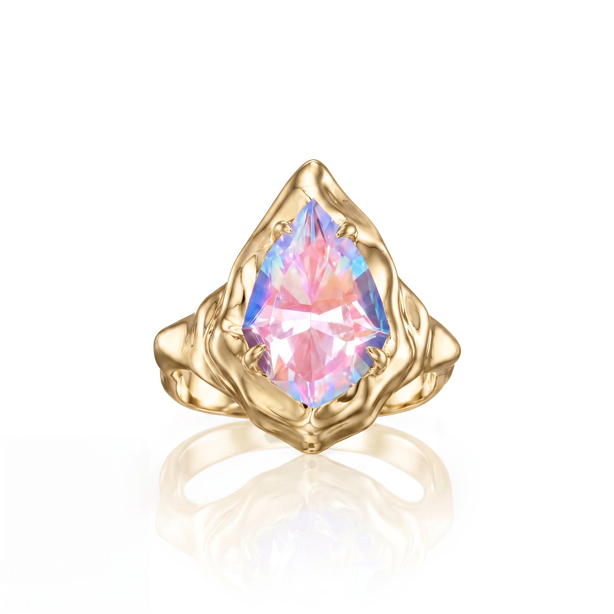Pear moonstone engagement ring on hand featuring a 2.8 CT colorful moonstone with rare sunset hues in sculptural yellow gold