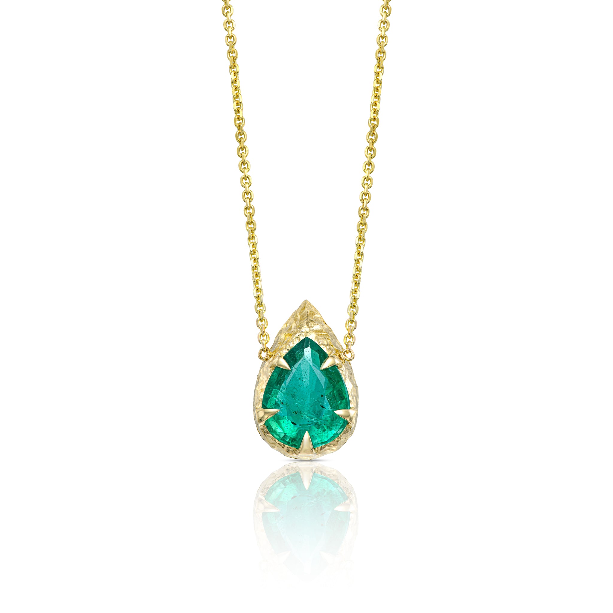 Front view of 1.95 ct natural pear-cut emerald pendant in a sculptural hand-carved 14K yellow gold setting.
