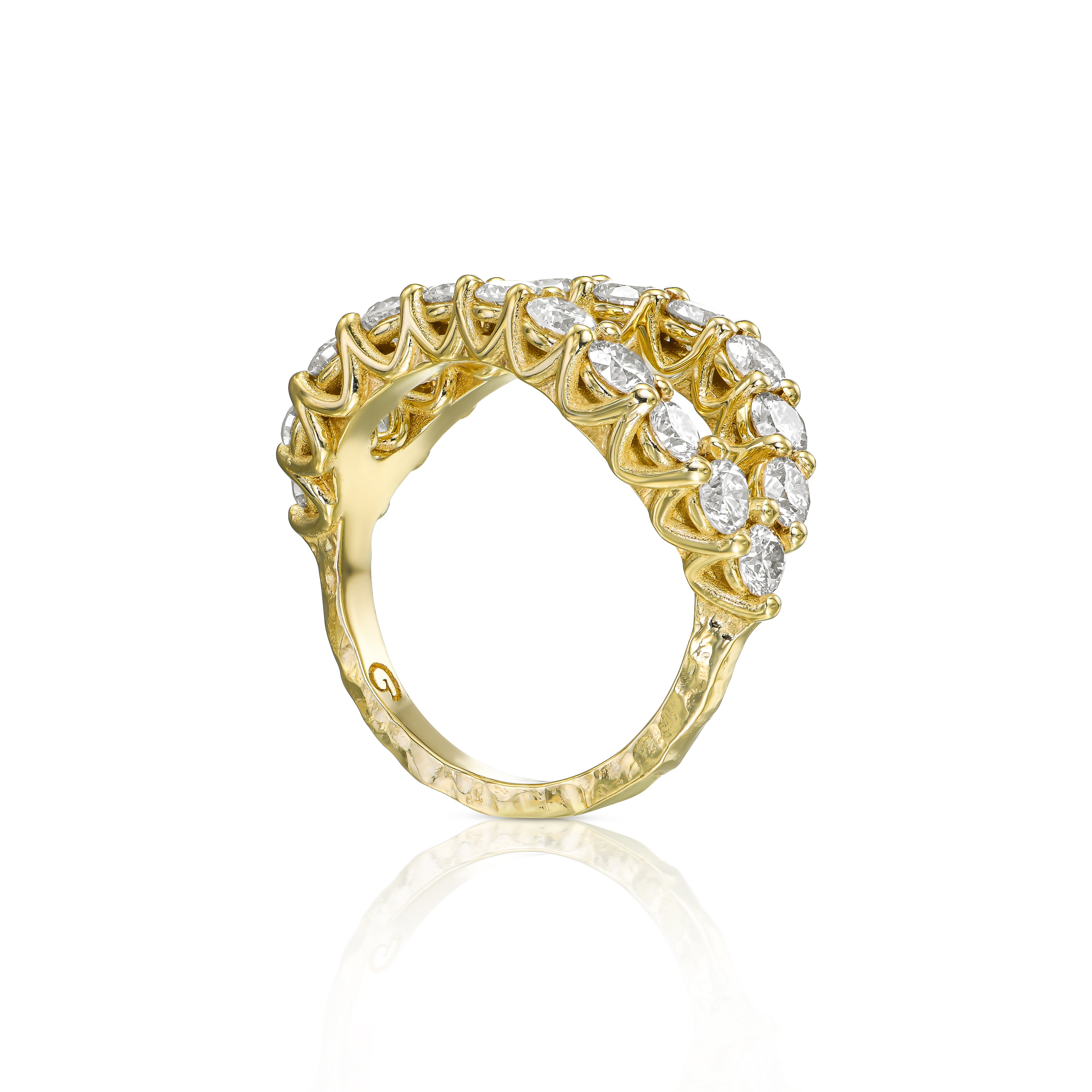 Top view of bold Adama diamond ring with round natural diamonds and hand-carved textured gold detailing.