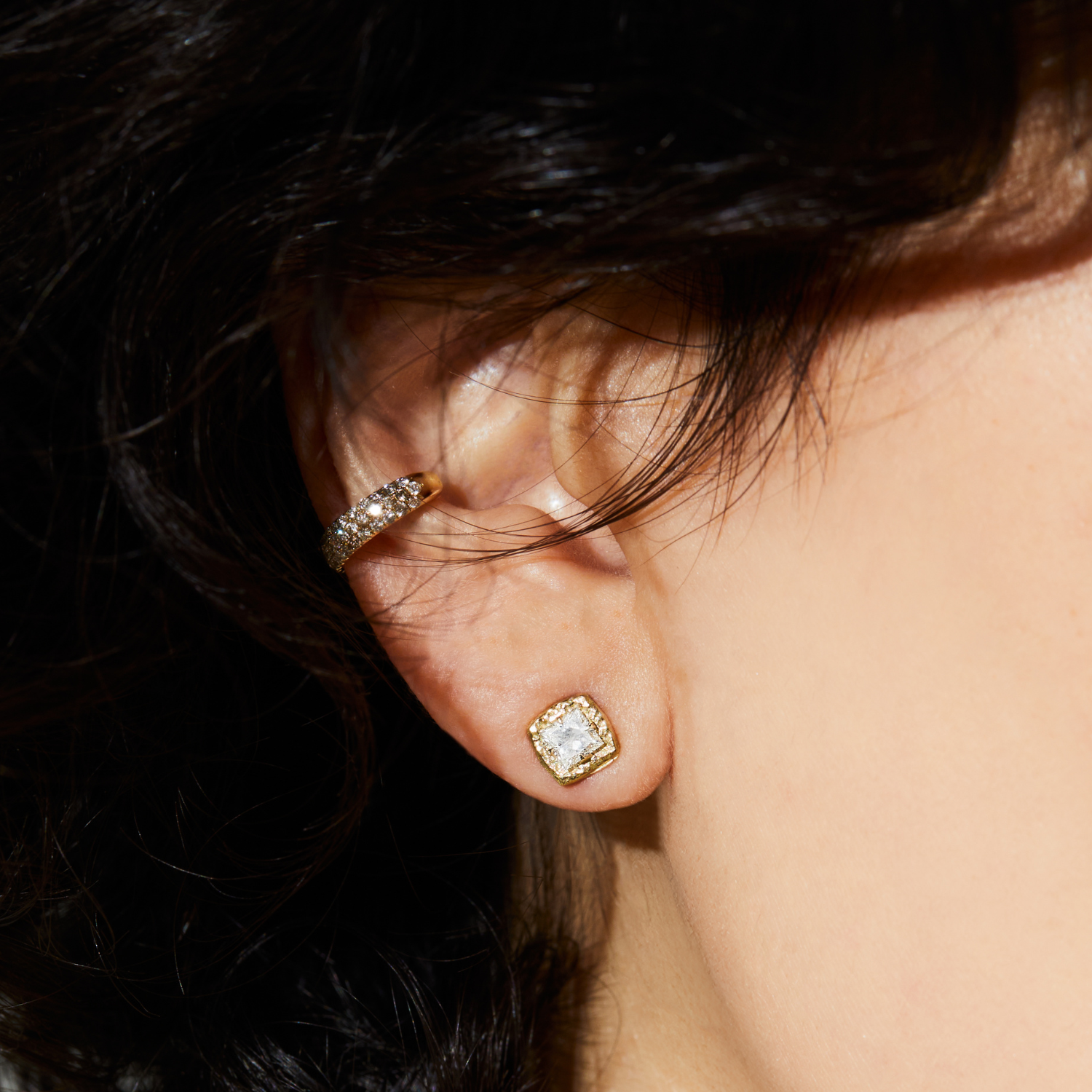 princess cut diamond earrings in 14K oganic textured yellow gold